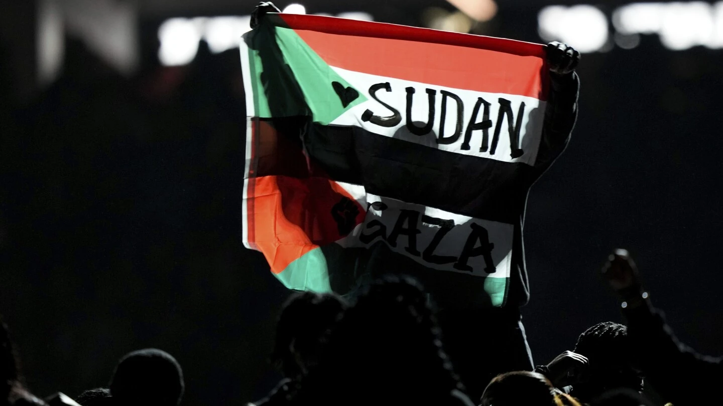 Super Bowl halftime performer detained after unfurling Sudanese-Palestinian flag