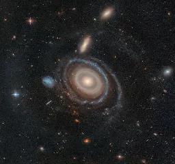 The Bullseye galaxy is 250,000 light-years across, nearly two-and-a-half times larger than our 100,000 light-year-wide Milky Way.  The galaxy is 567 million light-years from Earth in the constellation