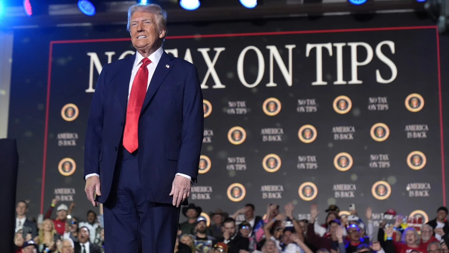 Trump leans into his pledge to eliminate taxes on tips at a Las Vegas rally