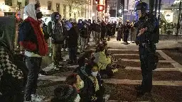 108 arrested, 4 officers hurt as protest encampment cleared at Emerson
