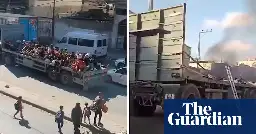 Footage shows moments before and after Israeli airstrike hits civilian convoy fleeing Gaza – video