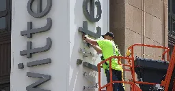 Twitter removed half its HQ sign — then the police arrived