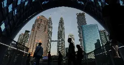 Malaysia halts music festival after same-sex kiss by UK band The 1975