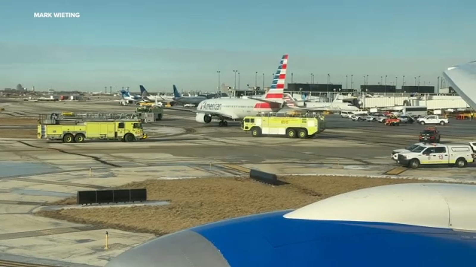 American Airlines flight's wing clips United Airlines plane on taxiway at O'Hare airport: FAA