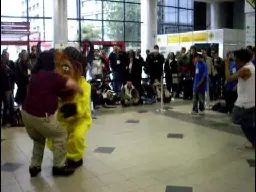 Richard Stallman dancing with GNU on FISL 10