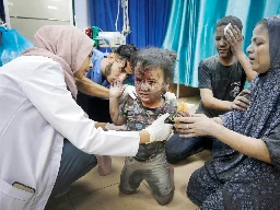 Israeli attack hits medical convoy at Gaza hospital gate, officials say