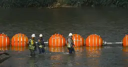 Justice Department threatens Texas with legal action over floating barrier in Rio Grande