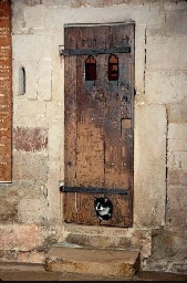 The north tower of Exeter Cathedral features perhaps the oldest known surviving cat door, dating to the 14th century - Lemmy.world