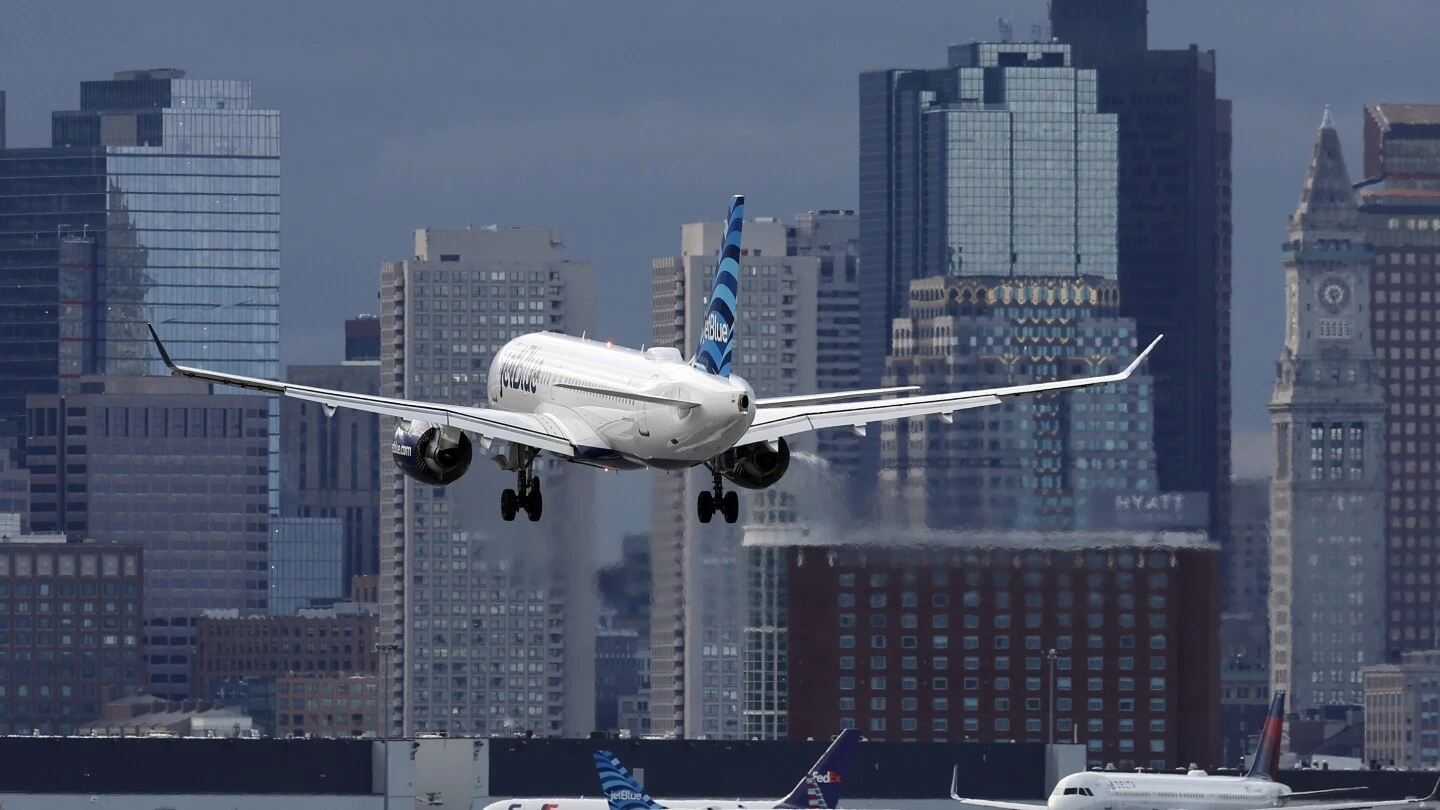 JetBlue passenger suddenly opens exit door as flight is taxiing for takeoff at Boston airport