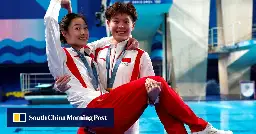 Chinese gold medal winners’ poses sparks social media jokes about relationship