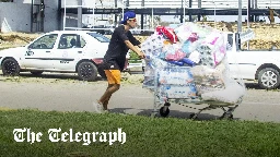 Pictured: Mexicans loot shops after Hurricane Otis devastates Acapulco