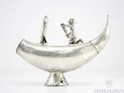 Chimu silver figurine depicting two people in a boat, 1300 AD - 1532 AD