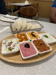 Pita platter came with 6 different dips[OC]