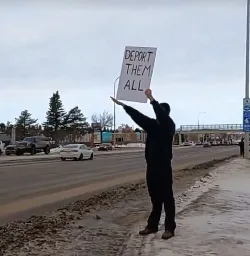 A bunch of losers went out and threw Nazi salutes in Alberta, Canada yesterday while holding racist signs.