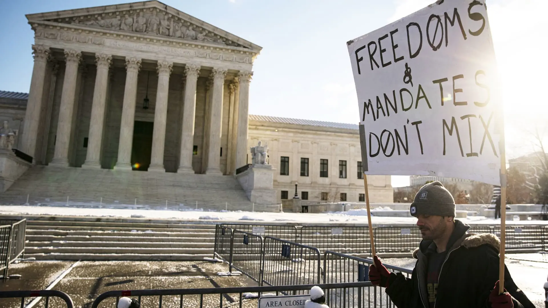 Supreme Court blocks Biden Covid vaccine mandate for businesses, allows health-care worker rule