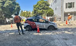 Cruise robotaxi finds itself stuck in wet concrete in San Francisco