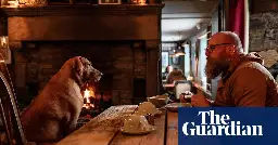 ‘It makes you feel like a kid again’: snowed in at Britain’s highest pub