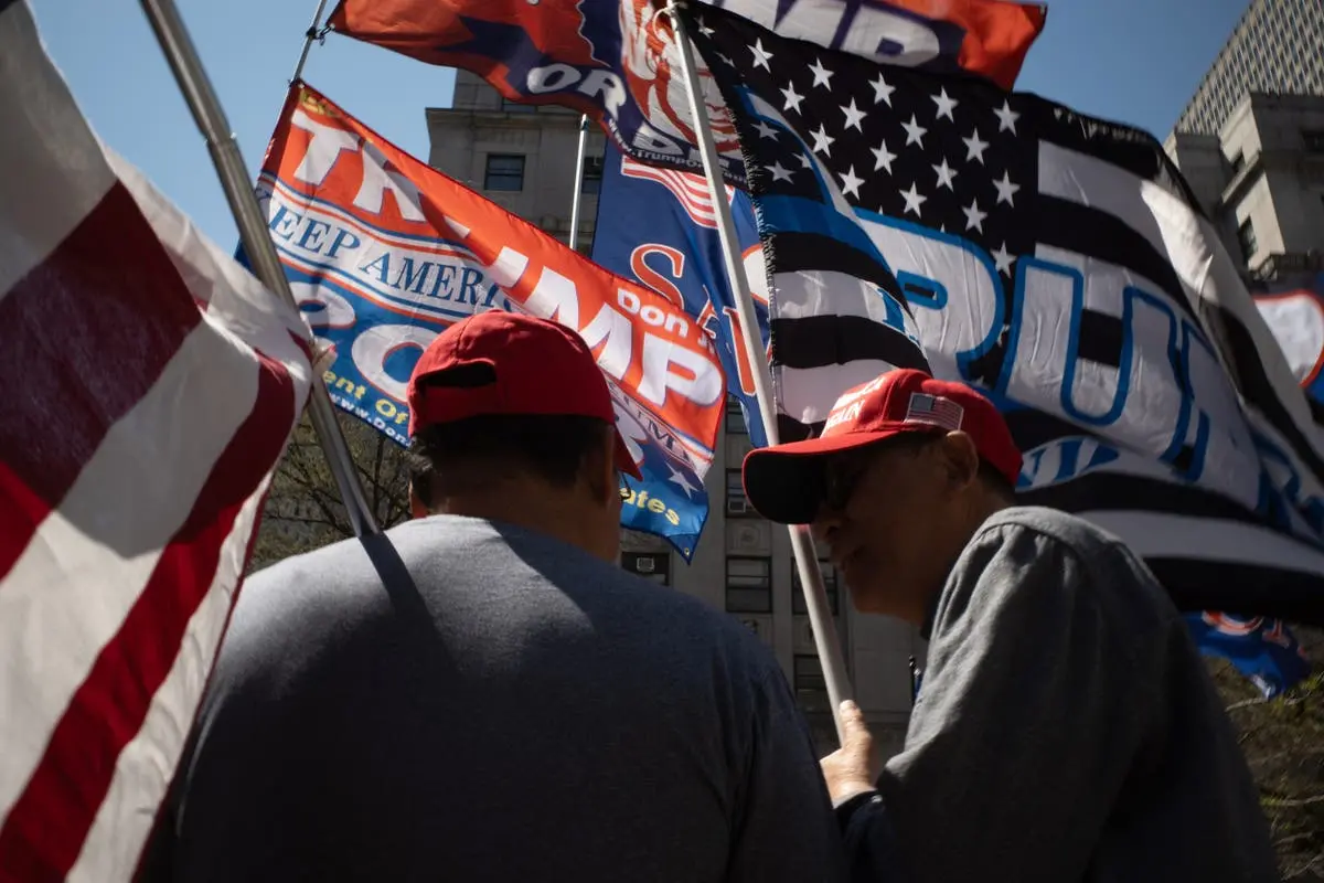 Trump supporters gather outside courthouse and ask: Who among us hasn’t paid for sex?