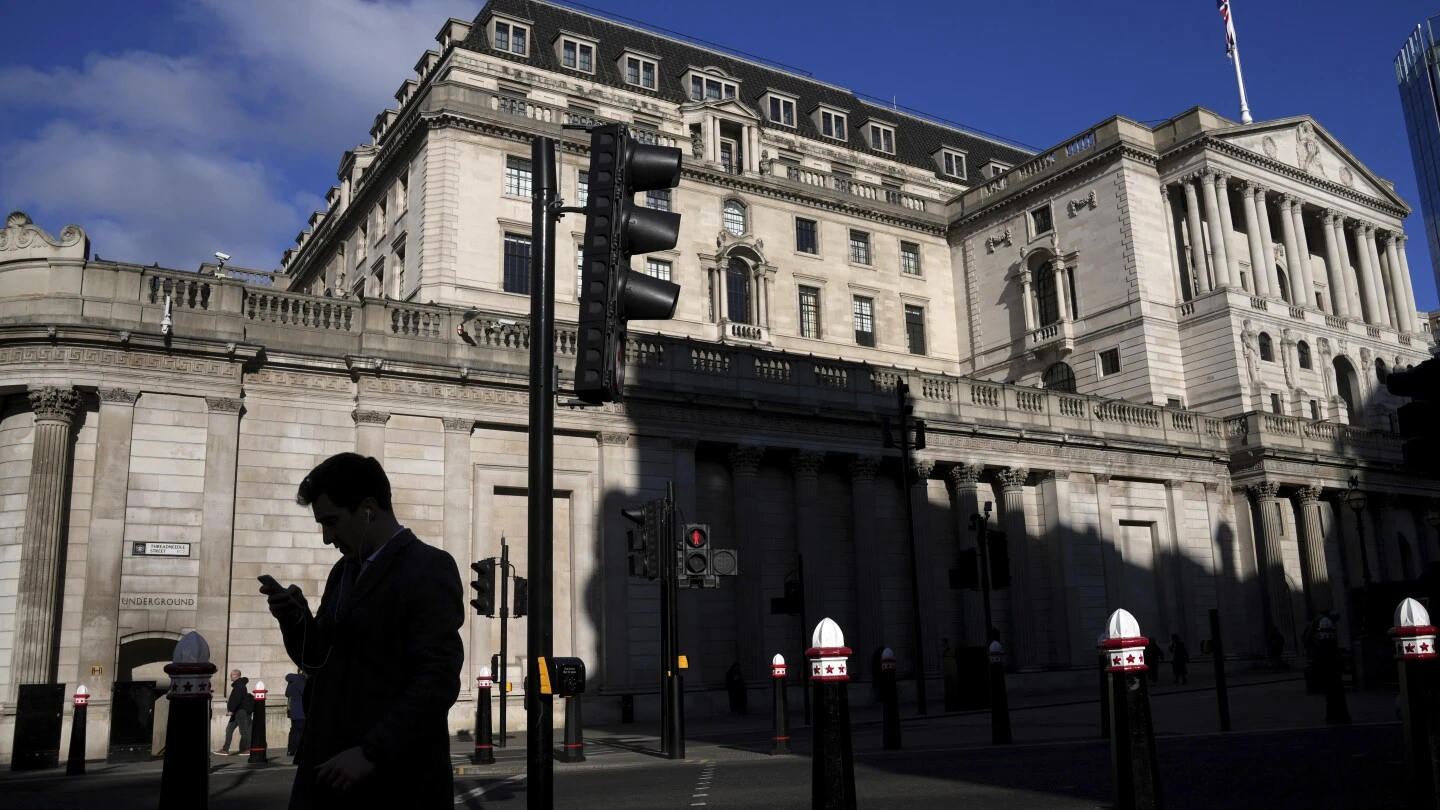 Bank of England halves UK growth projection and cuts main interest rate to 4.50%