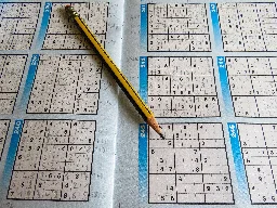 A new message encryption scheme inspired by the Sudoku puzzle