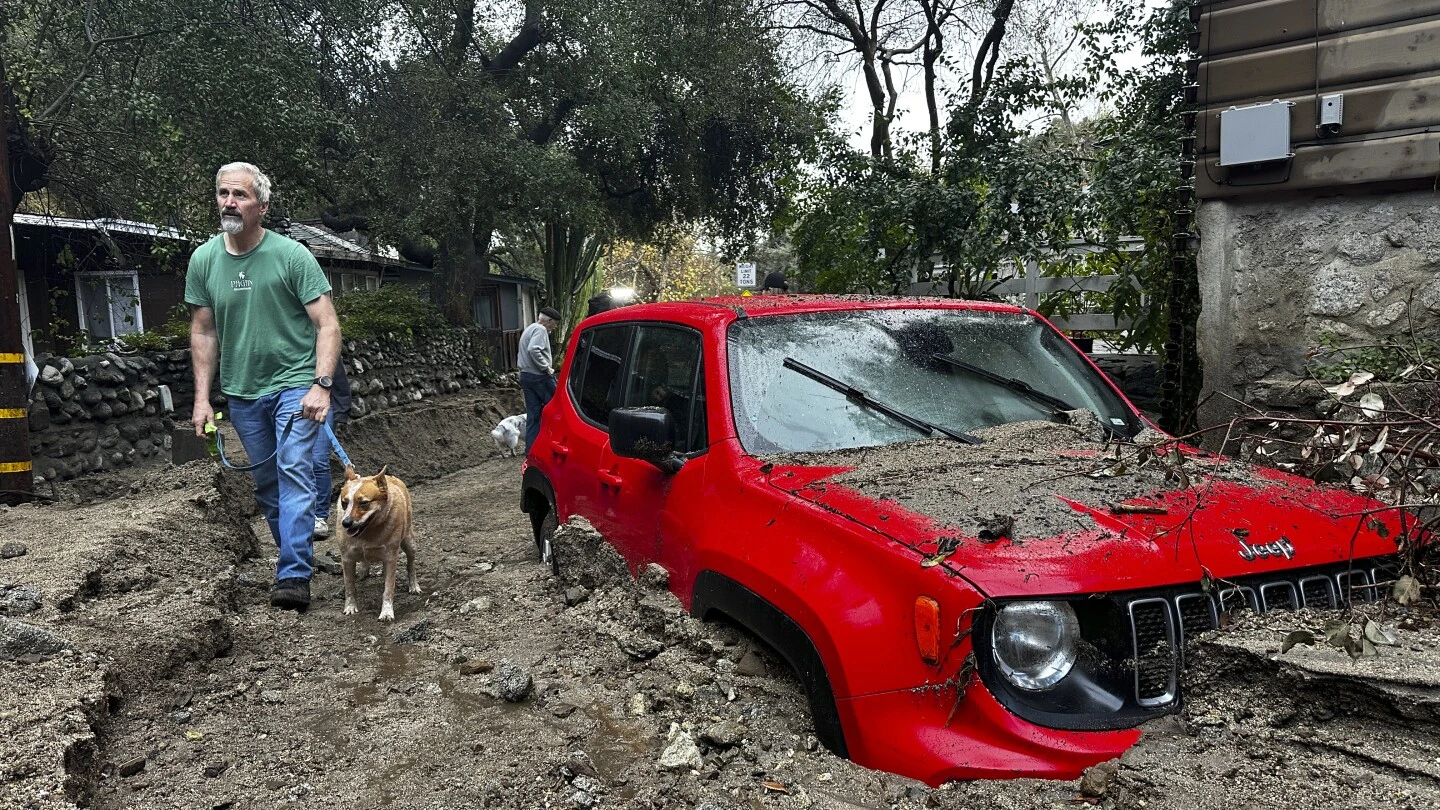 Eastern U.S. braces for flooding while fire-damaged California city now faces mudslides