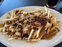 [I ate] poutine w/sautéed onions