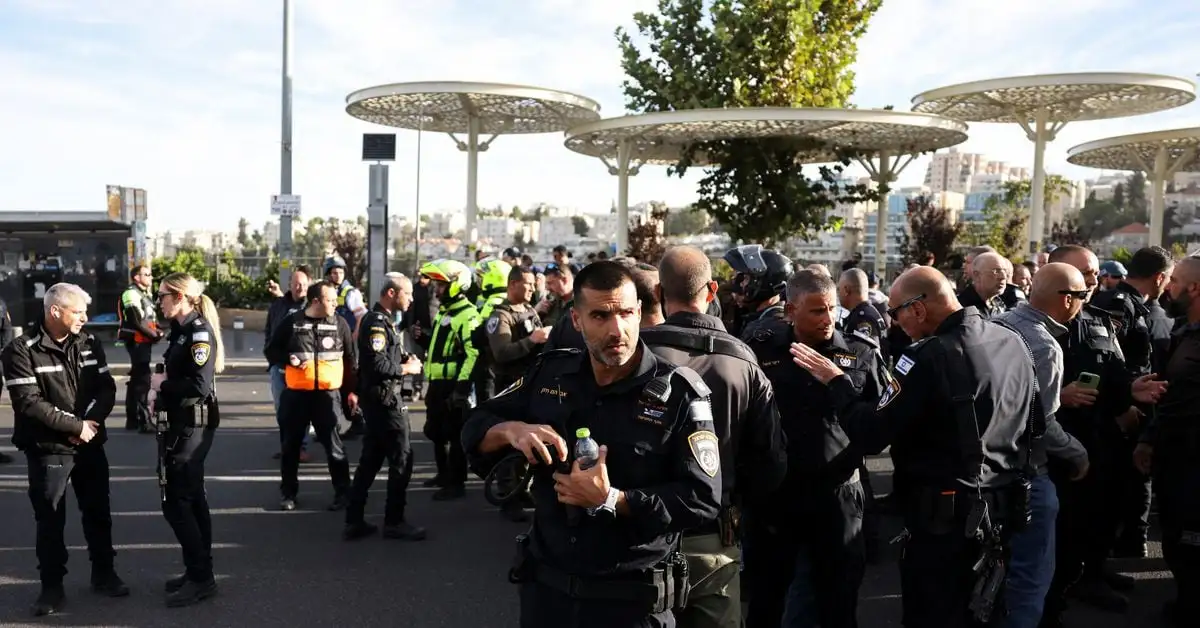 Two Hamas gunmen open fire at Jerusalem bus stop, killing three